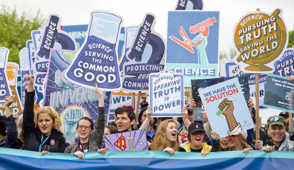 A Group Of Scientists Rallying For Logic And Science