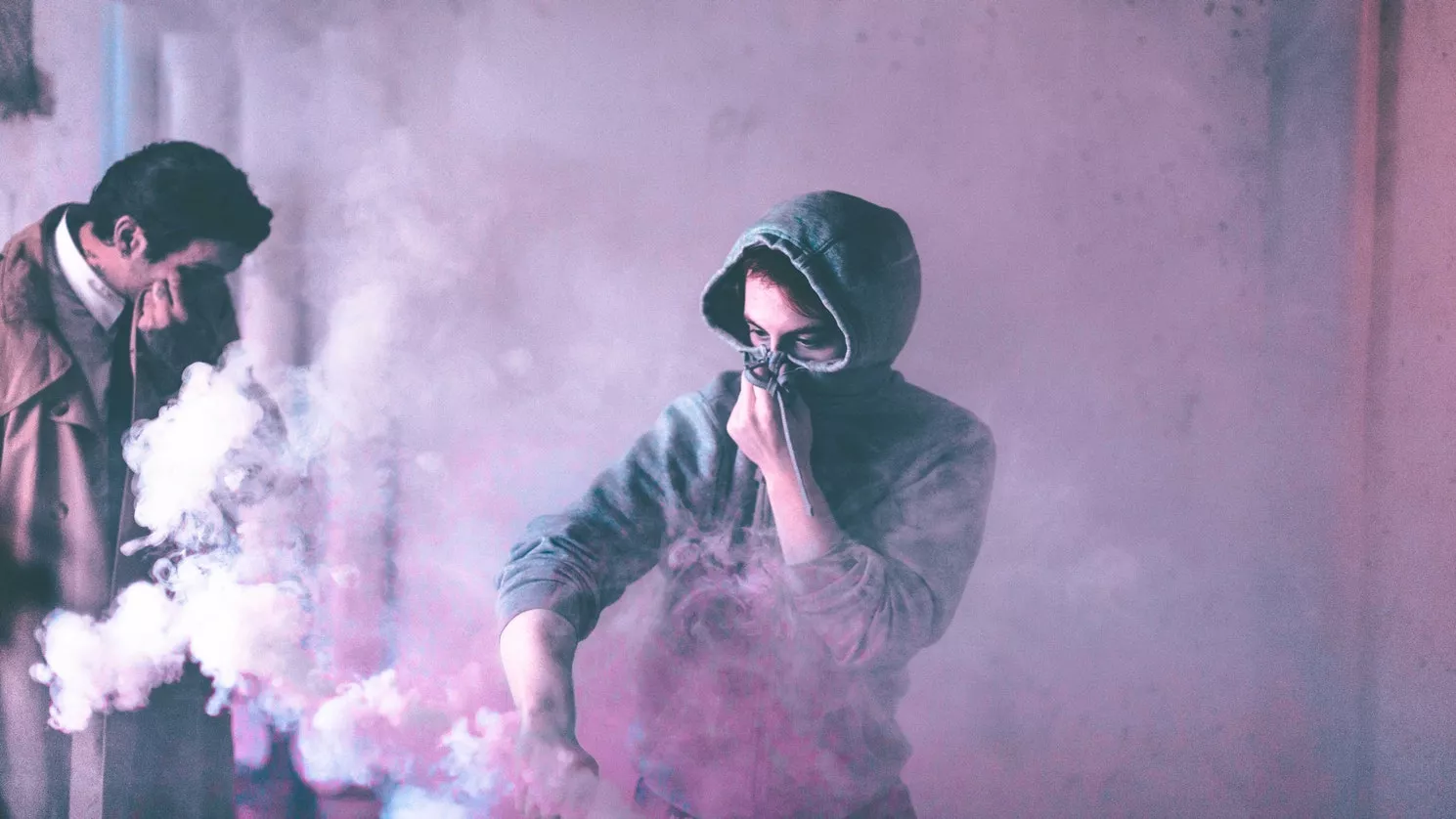 Woman covering her nose smoke