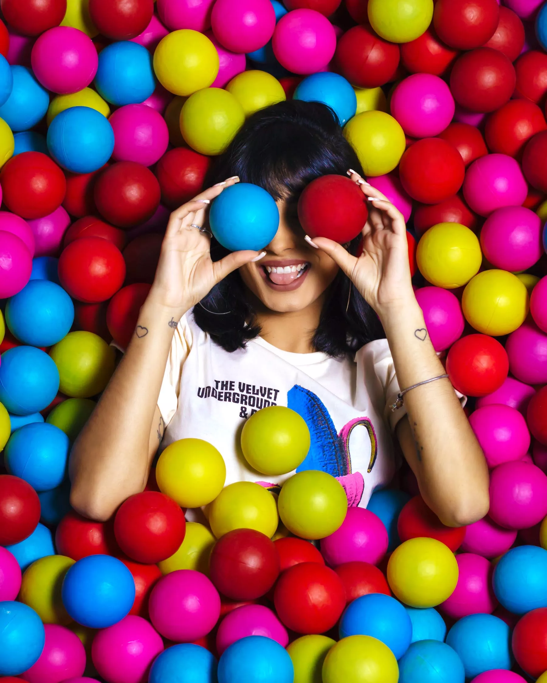 A Woman In A Ball Ball Pit